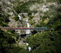 Kuranda Scenic Rail passing by Stoney Creek Falls