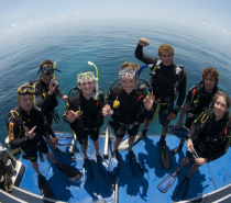 Big smiles all around from our new Open Water divers!