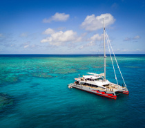 Sailing on a stylish and fast catamaran to two unique outer reef destinations