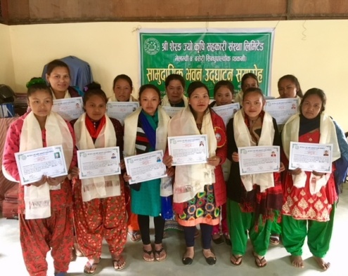 Proud graduates of the Baseri sewing program
